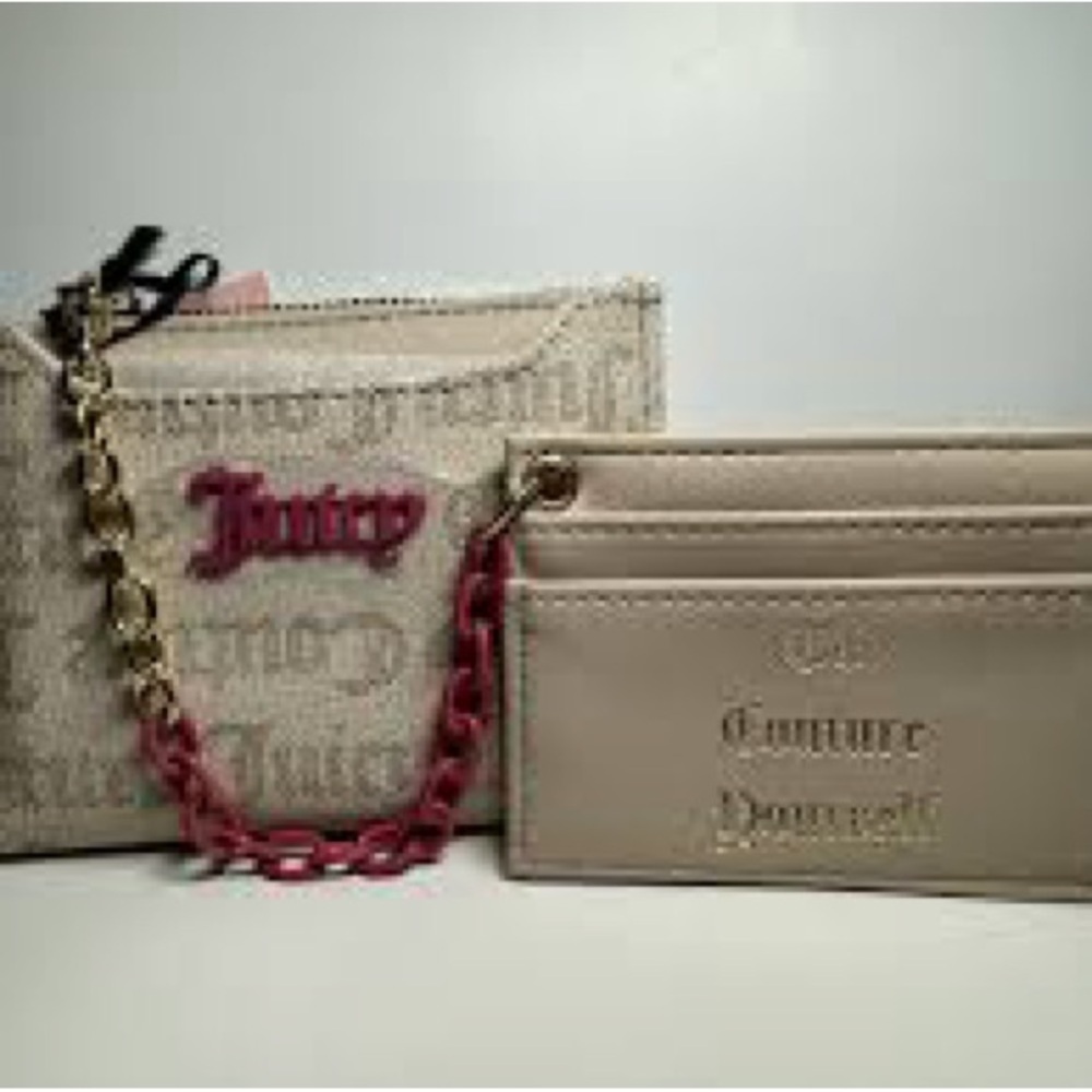 Juicy Couture “Can't Tame Her" bifold wallet with a pullout card holder.